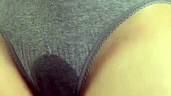 This blonde girl is peeing in her panties, what a naughty sight