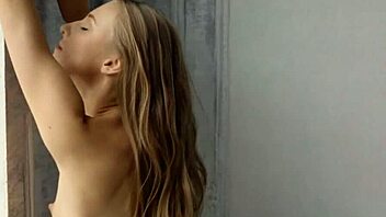 Tiny Russian teen Nimfa undresses in softcore video