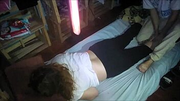 Latina milf gives rich massage to partner at night.