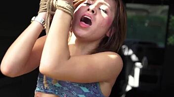Beautiful woman gets rough facial after hitchhiking and being tied up by a strange dom