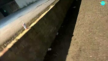 Street whore pushes items into her shaved pussy in public close-up