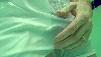 Pool boy Xnxxjohn shows off in see-through outfit. Underwater, his big cock is visible.