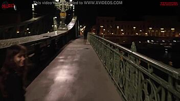 Risky lesbian sex in public on a bridge between passersby.