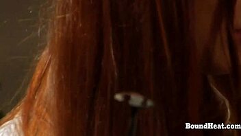 Lesbian slave undergoes branding and training for obedience