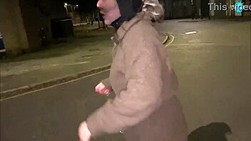 Street whore pushes items into her shaved pussy in public close-up