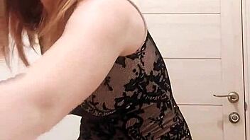 Big-boobed blonde masturbates with a dildo in the toilet