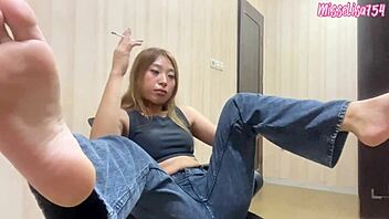 Smoking fetish combined with foot slave worship