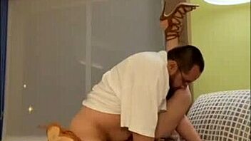 Latina Beauty in See-Through Stockings Gives Handjob Outdoors Near Hotel Window.