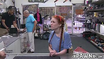 the little redhead temptress fucks in the pawnshop to earn money