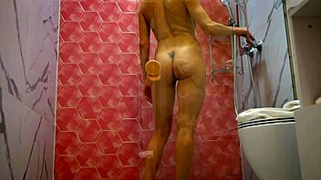 Belinda Selin enjoys a relaxing shower with a dildo close up