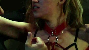 bound participant explored with toys in stylish attire