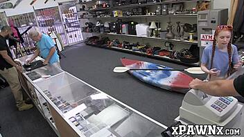 the little redhead temptress fucks in the pawnshop to earn money