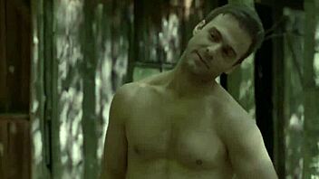 Steamy scene of a British hunk having sex with a gay couple in the woods