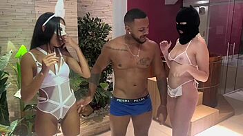 black guy enjoys easter with two bunnies