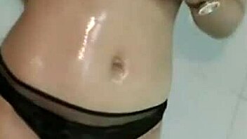 Beautiful Asian woman strips in the moonlight in a web chat