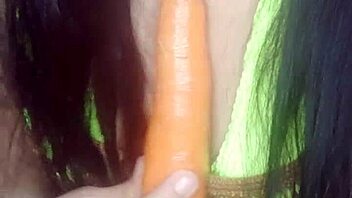 Latina babe enjoys wild fun with her toy carrot. It’s a spicy solo treat!