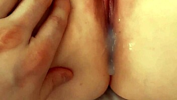 Redhead's solo play with crypto porn and fingering for ultimate orgasm