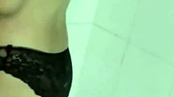 Beautiful Asian woman strips in the moonlight in a web chat
