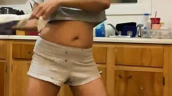 Anna Maria is a Caribbean MILF who performs hot dance moves while washing dishes