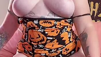 A curvaceous woman with a hairy beaver gets an orgasm with a dragon dildo in pussy play