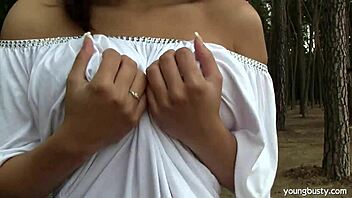 Rita, a busty teen, solo pleases herself outdoors