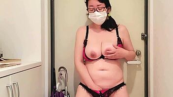 Asian MILF Masturbates Boldly at Door