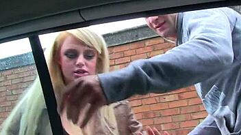 British babe with big tits eagerly masturbates in the car, ripping clothes while waiting.