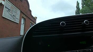 British babe with big tits eagerly masturbates in the car, ripping clothes while waiting.