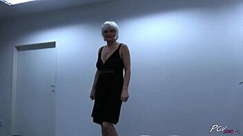 Busty milf with fake hair enjoys a special meal after workout