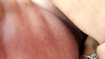 Intimate car session involving fisting and wet pussy play