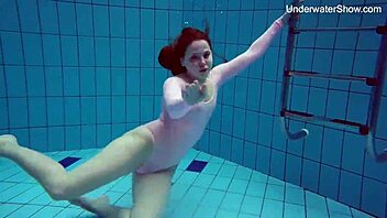 Simonna gets wild and horny in public pool