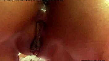 This solo brunette is stroking her cunt with a sex toy. So hot!