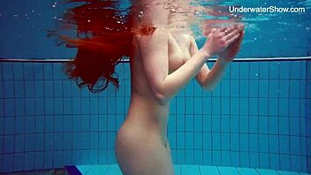 Petite brunette Simonna enjoys public swimming pool intimacy