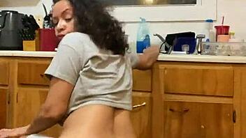 Anna Maria, a mature and sensual Latina woman, performs while washing the dishes