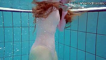 Simonna gets wild and horny in public pool