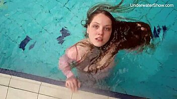 Simonna gets wild and horny in public pool