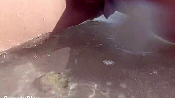 my shaved pussy dripping while peeing on public beach