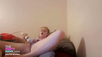 Adorable pale ginger enjoys a relaxing session while moaning softly in the panty bank