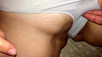 A trimmed video of amateurs exploring pussy in a neutral setting.