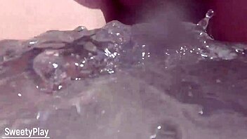 my shaved pussy dripping while peeing on public beach