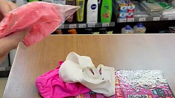 Asian ladyboy shows new thong in convenience store