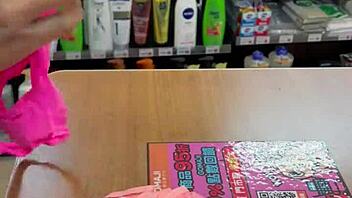 Asian ladyboy shows new thong in convenience store