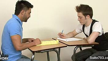 Young gay men with tattoos having sex in the classroom