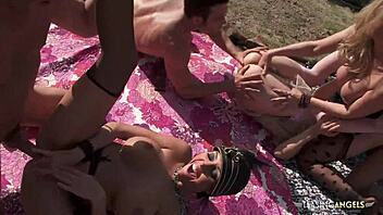 Girls ride cock in outdoor group sex 😉