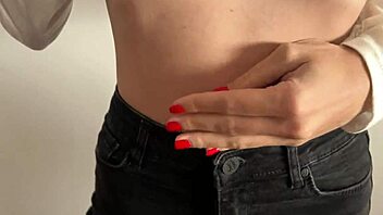 A young and petite woman gives a homemade video of her rubbing her pussy and having an orgasm