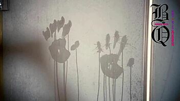 Doll bound in latex masked and controlled with condom