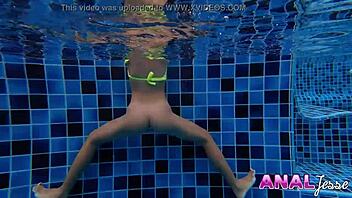 skinny asian babe swimming with a huge butt plug, damn hot! 🍑