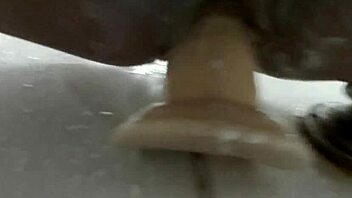 I was masturbating with my dildo in the shower, feeling the water run over me