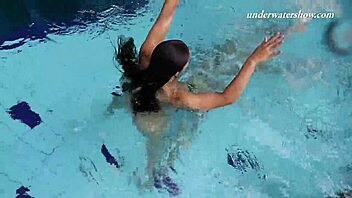 Hey, Iva Brizgina and Paulinka, hot lesbian action by the pool!