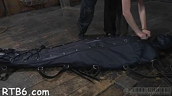 Enchanting gal endures brutal whipping session in bondage